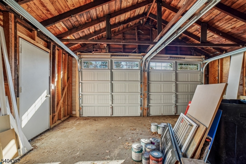169 Diamond Spring Road Denville, NJ 07834 - Photo 30 of 31 a view of an empty room with wooden floor and furniture