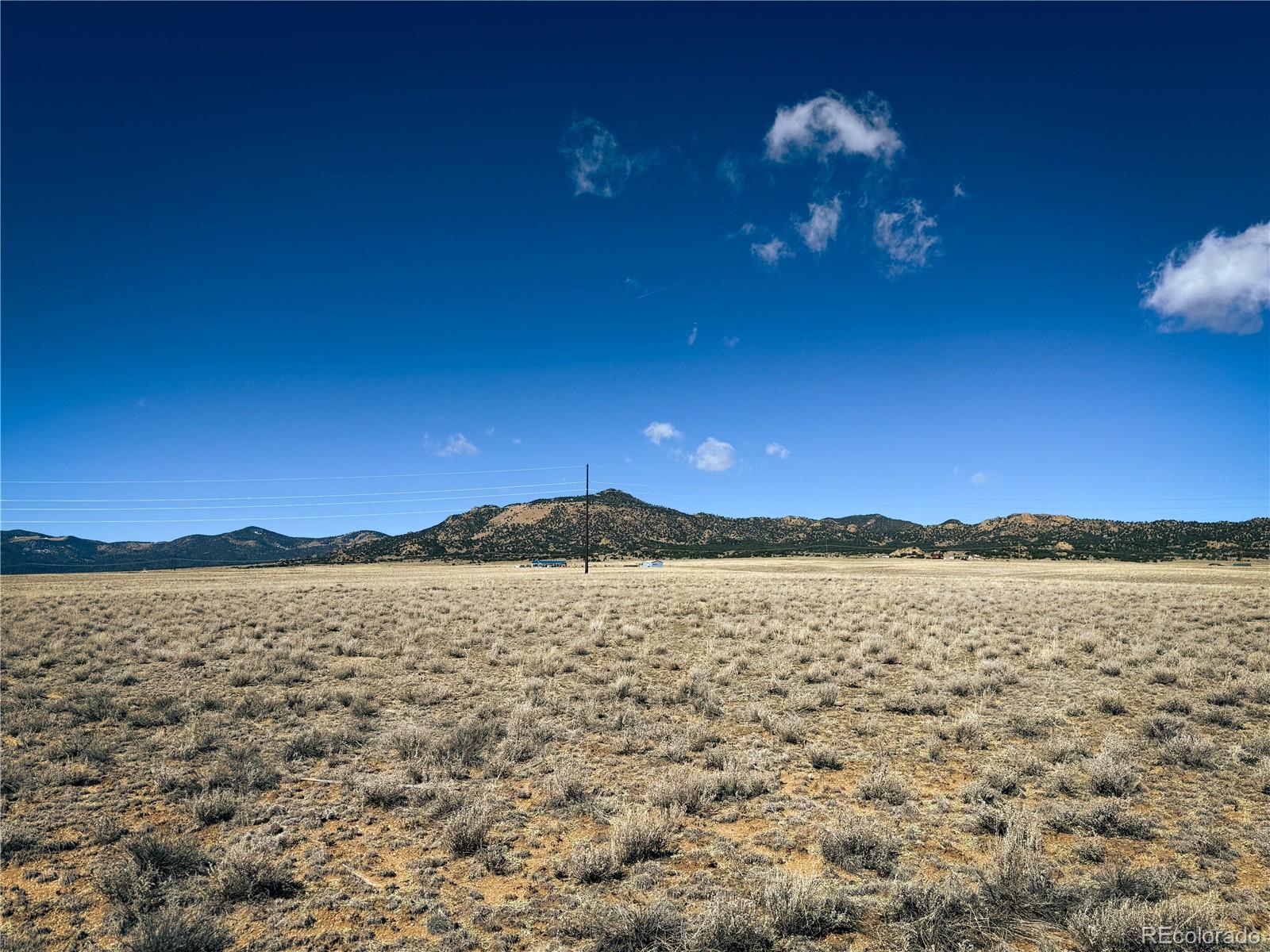 113 Ewing Ranch Moffat, CO 81143 - Photo 4 of 18 a view of lake and sunset