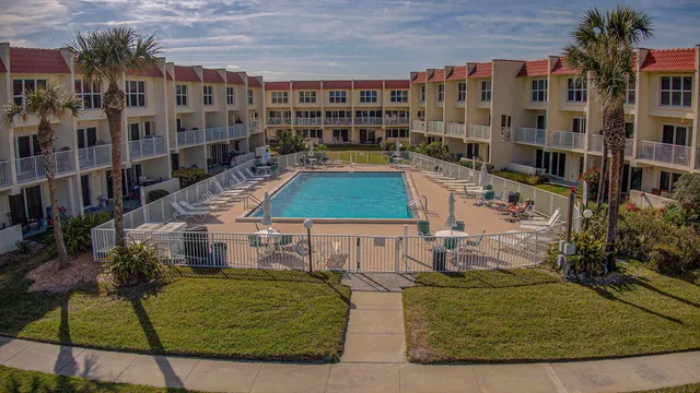 a kitchen with stainless steel appliances granite countertop a stove and cabinets