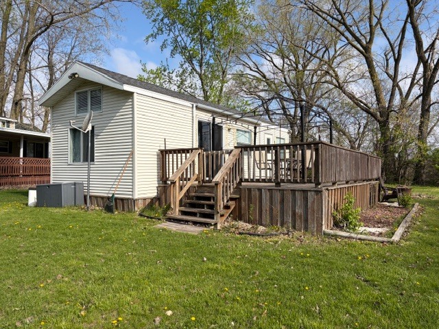 2795 East 28th Road Marseilles, IL 61341 - Photo 1 of 56 a view of a backyard with a garden