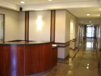 a room with gym equipment and a large window