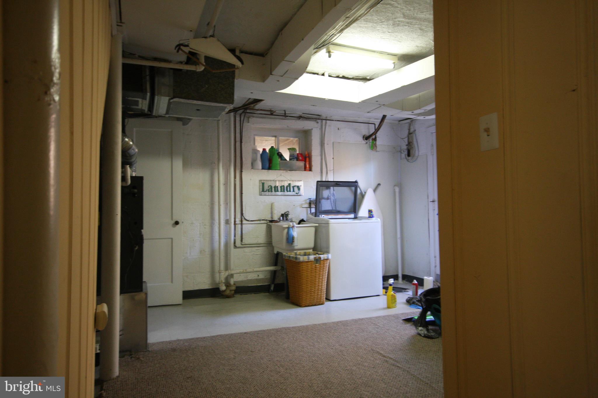 9506 Wire Avenue Silver Spring, MD 20901 - Photo 45 of 72 The HVAC, Water Heater, Laundry Room, 1/4 Bath