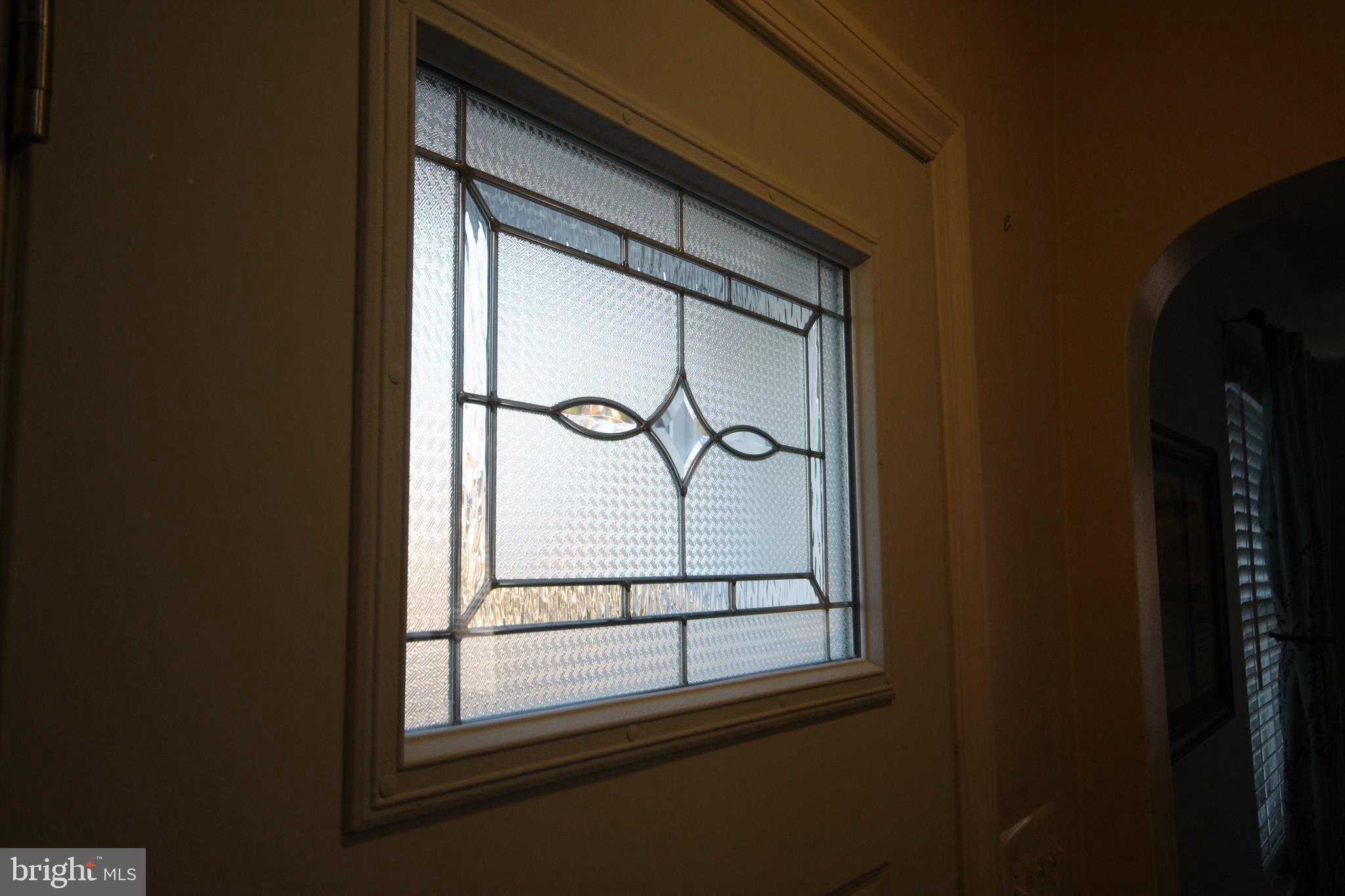 9506 Wire Avenue Silver Spring, MD 20901 - Photo 53 of 72 The Glass in The Newly Installed Front Door