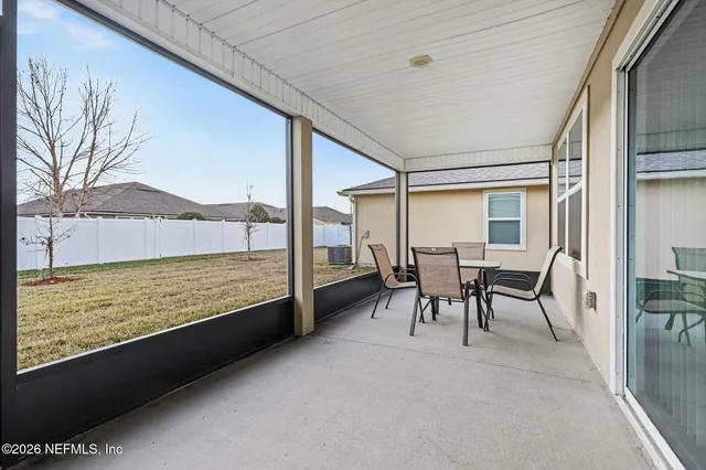 a house with trees in the background