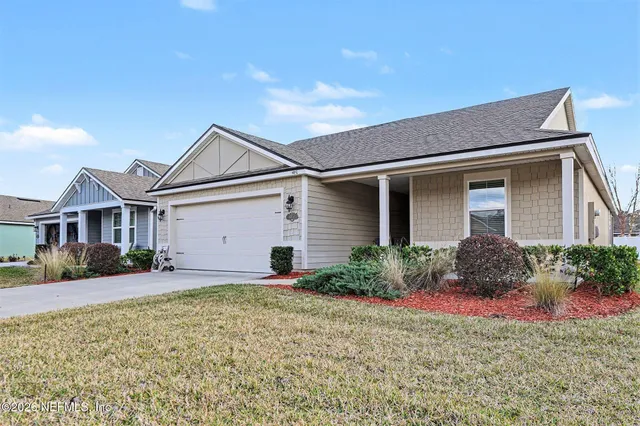 a house view with a garden space