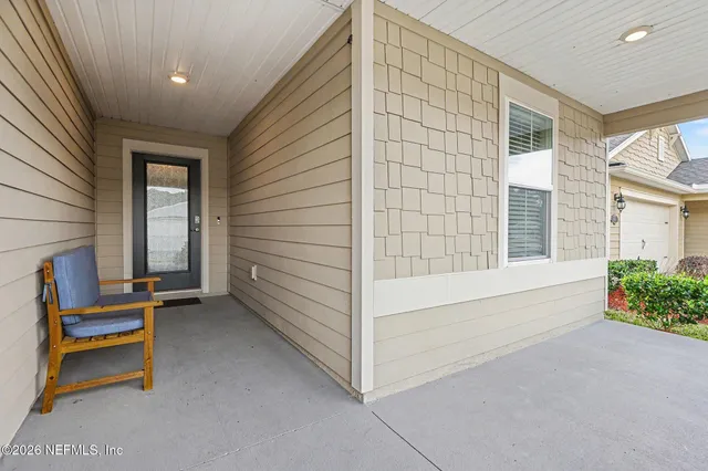a view of a hallway with a furniture