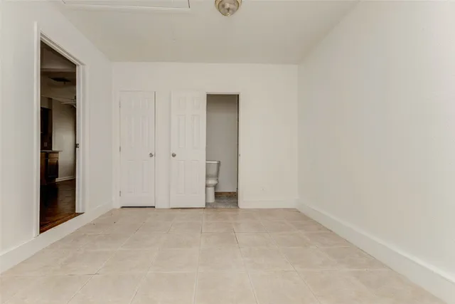 an empty room with closet