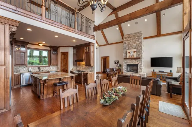 a view of a dining area with furniture window and wooden floor
