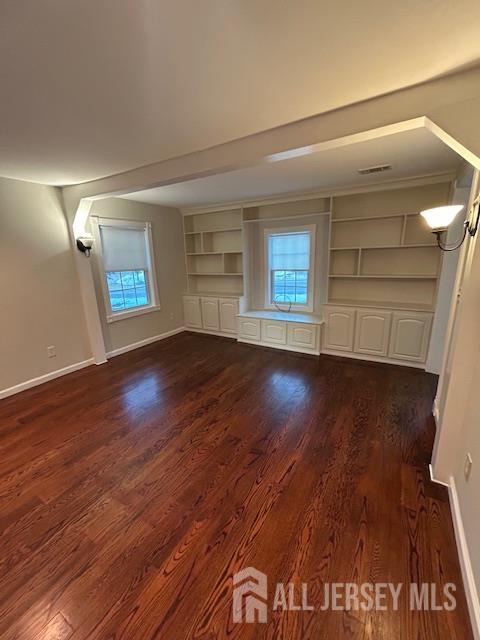 11 Pleasant Plains Road Franklin Park, NJ 08823 - Photo 7 of 8 an empty room with wooden floor and window