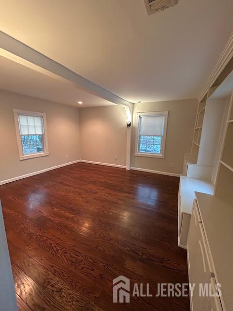 11 Pleasant Plains Road Franklin Park, NJ 08823 - Photo 8 of 8 a view of an empty room with wooden floor and a window