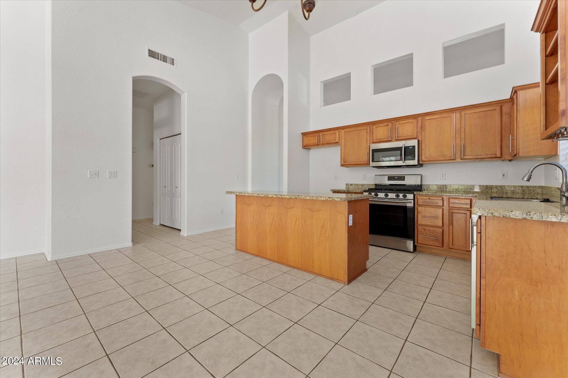 3055 North Red Mountain, Unit 216 Mesa, AZ 85207 - Photo 12 of 50 09-009-kitchen