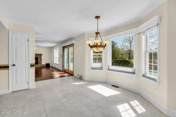 a kitchen with stainless steel appliances granite countertop a stove and a refrigerator