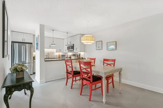 a view of a dining room with furniture