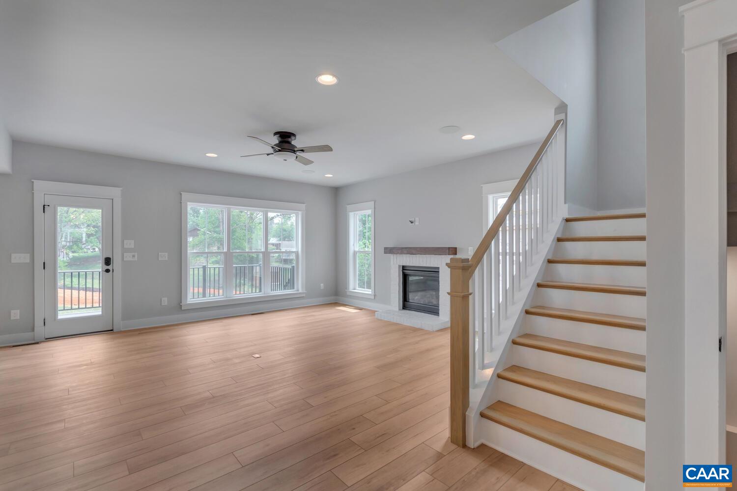 169 Agatha Ridge Lane Crozet, VA 22932 - Photo 21 of 73 wooden floor in an empty room with a window