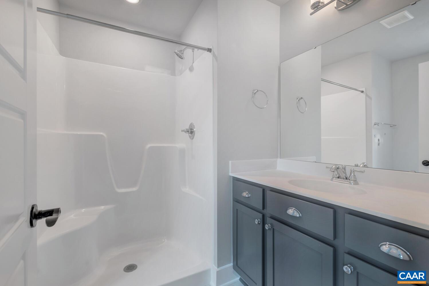 169 Agatha Ridge Lane Crozet, VA 22932 - Photo 60 of 73 a bathroom with a shower sink vanity granite and shower