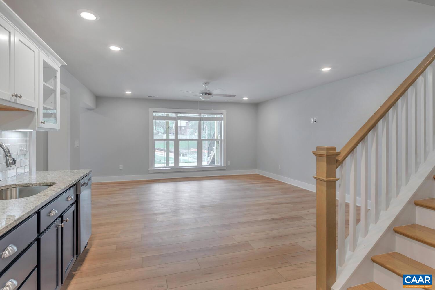 169 Agatha Ridge Lane Crozet, VA 22932 - Photo 65 of 73 a view of an empty room with wooden floor and a window