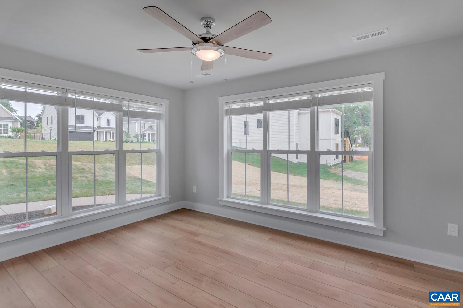 169 Agatha Ridge Lane Crozet, VA 22932 - Photo 69 of 73 a view of an empty room with wooden floor and a window