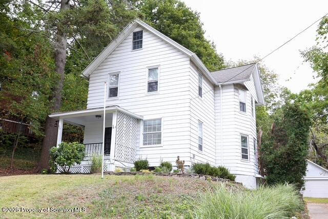 220 Clark Avenue Clarks Summit, PA 18411 - Photo 2 of 25 a view of a house with yard and a garden