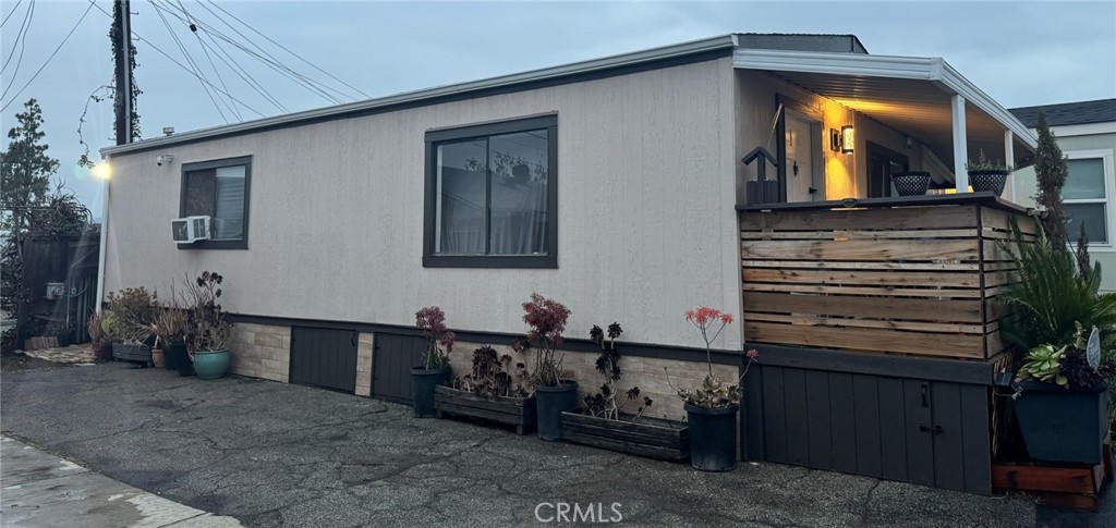 732 East Rte 66, Unit 4 Glendora, CA 91740 - Photo 2 of 6 a view of a house with a balcony