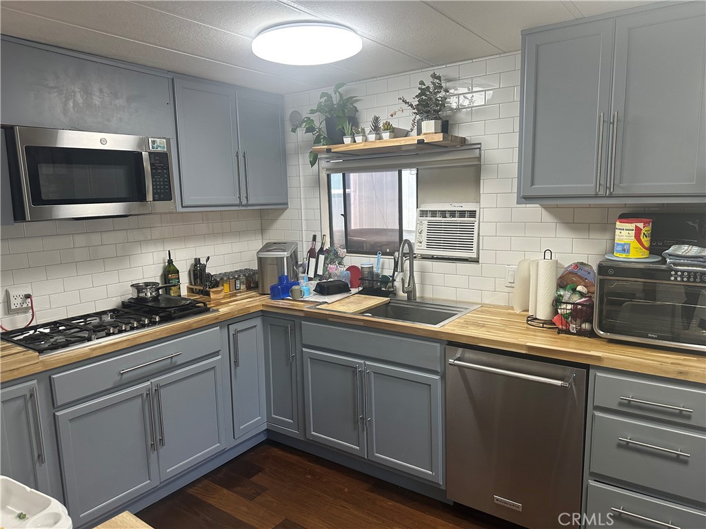 732 East Rte 66, Unit 4 Glendora, CA 91740 - Photo 4 of 6 a kitchen with a sink and cabinets