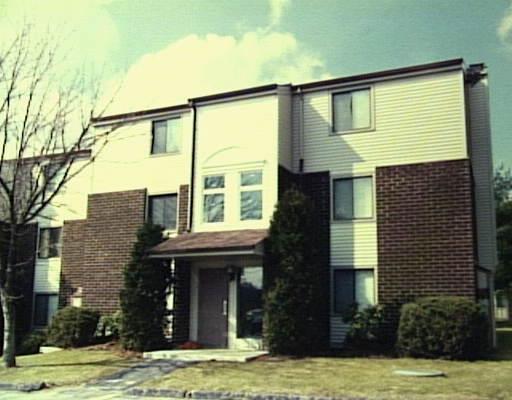 7 Padanaram Road, Unit 213 Danbury, CT 06811 - Photo 1 of 1 a view of a house with a swimming pool