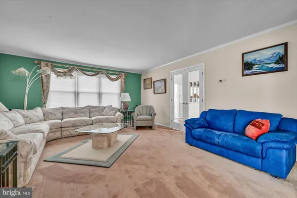 a living room with furniture and a couch