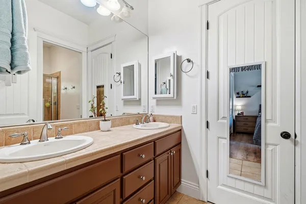 a bathroom with a toilet and a bathtub