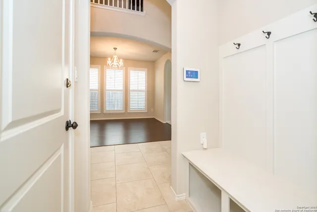 a view of kitchen with furniture and a living room
