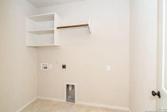 a bathroom with a double vanity sink and mirror with shower
