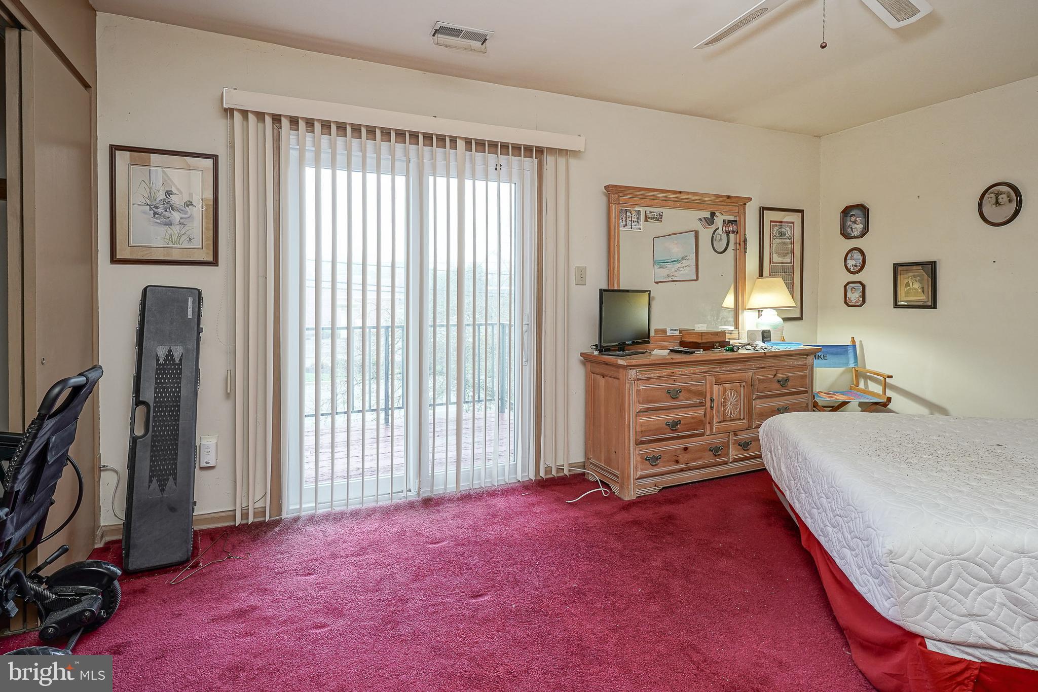 40 Tansboro Road, Unit 7B Berlin, NJ 08009 - Photo 16 of 20 a bed room with a bed and a dresser