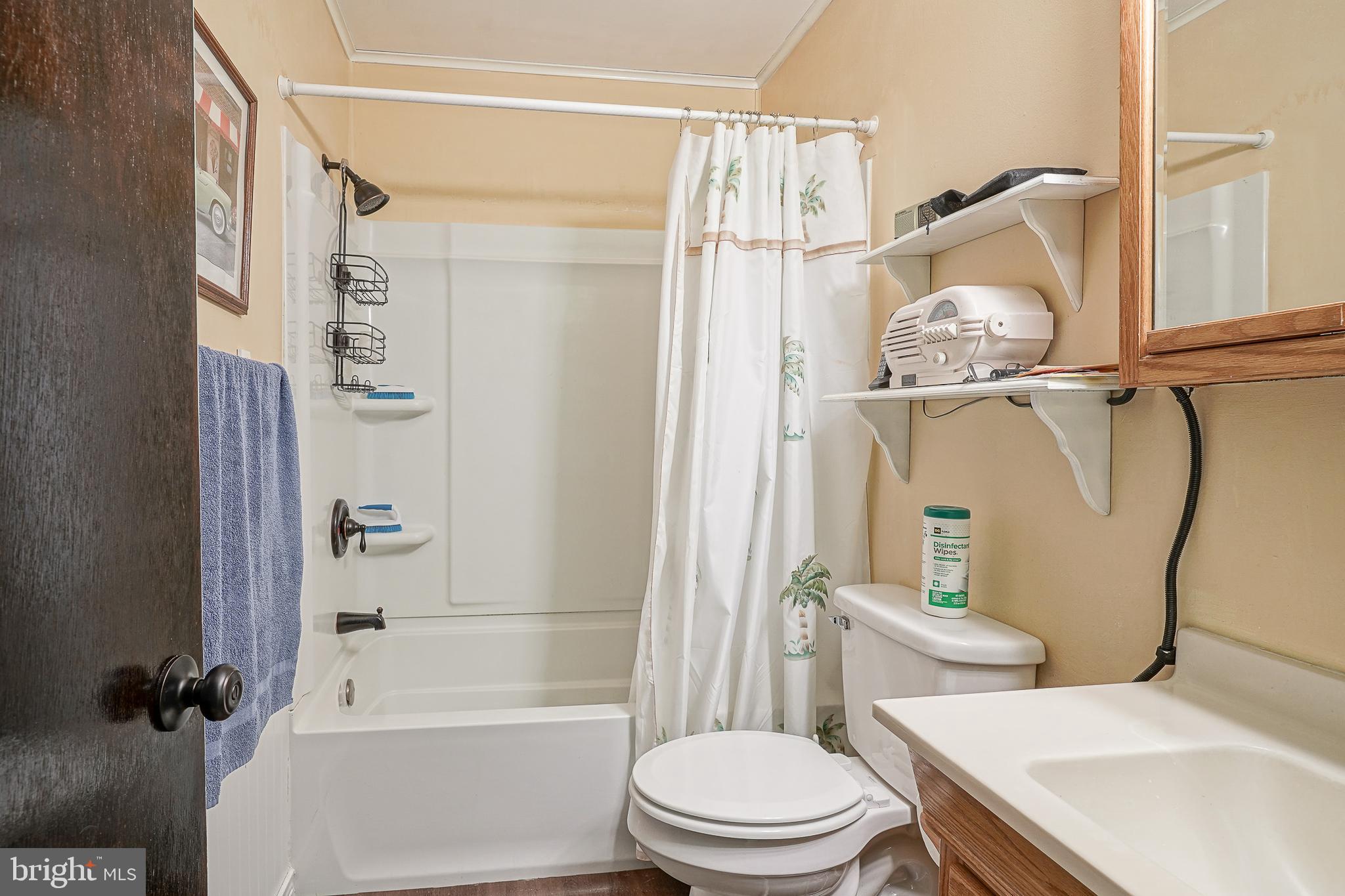 40 Tansboro Road, Unit 7B Berlin, NJ 08009 - Photo 17 of 20 a bathroom with a sink a toilet and shower