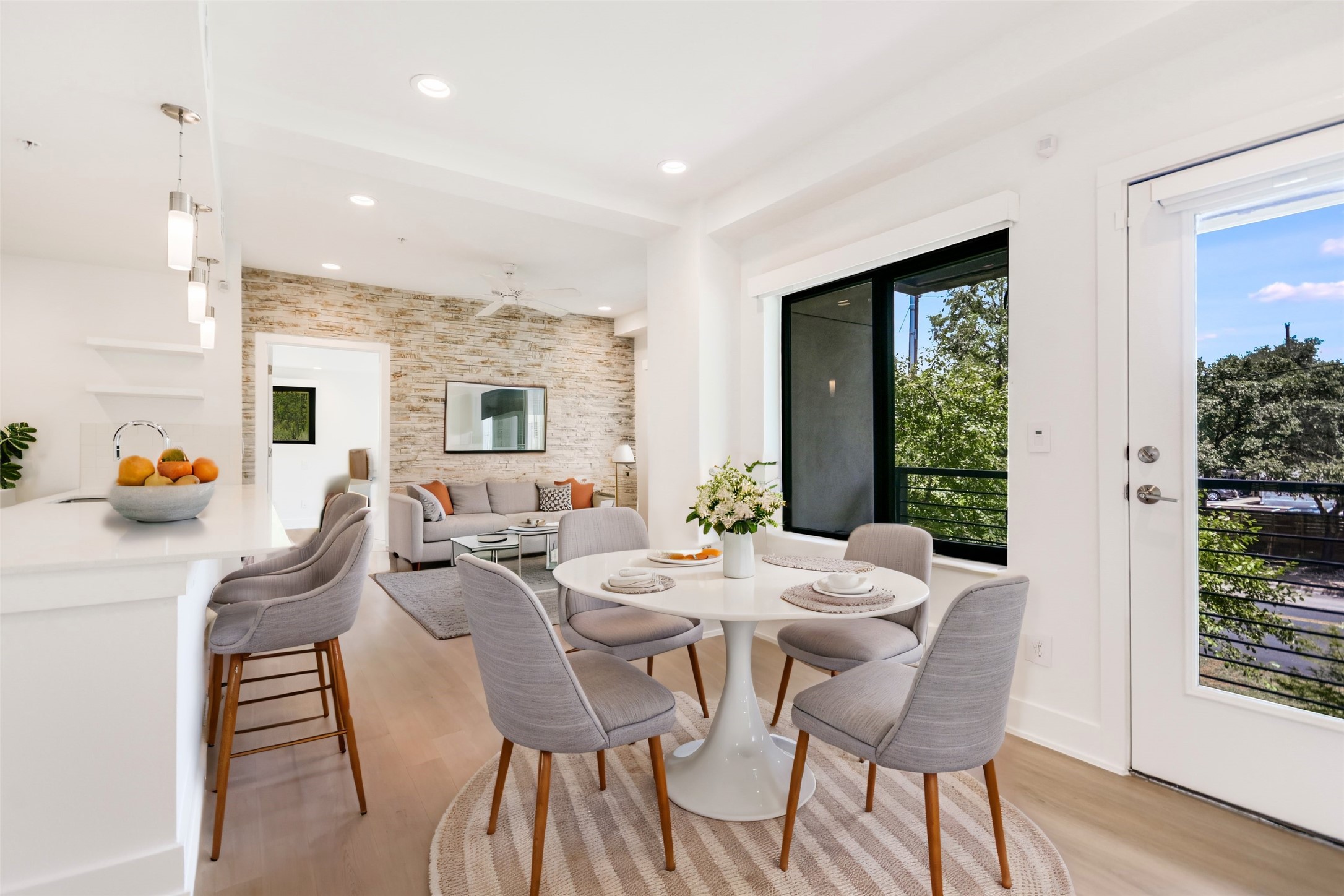 1603 Enfield Road, Unit 200 Austin, TX 78703 - Photo 13 of 27 a view of a dining room with furniture window and wooden floor