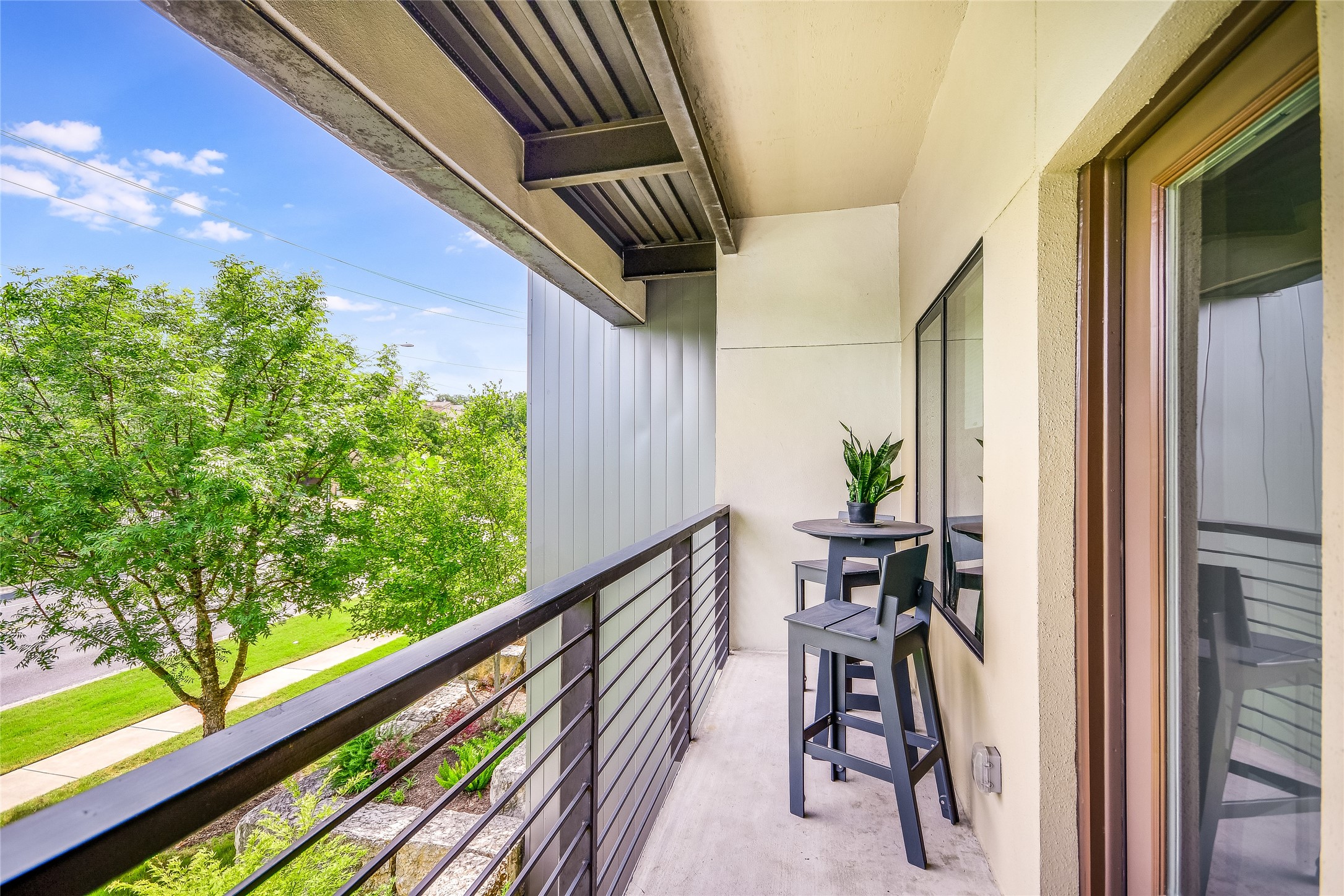 1603 Enfield Road, Unit 200 Austin, TX 78703 - Photo 14 of 27 a view of balcony with furniture