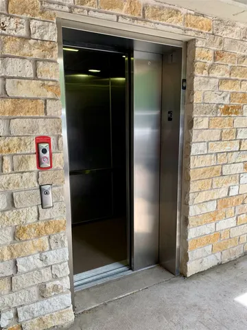 a view of entrance door of an empty room