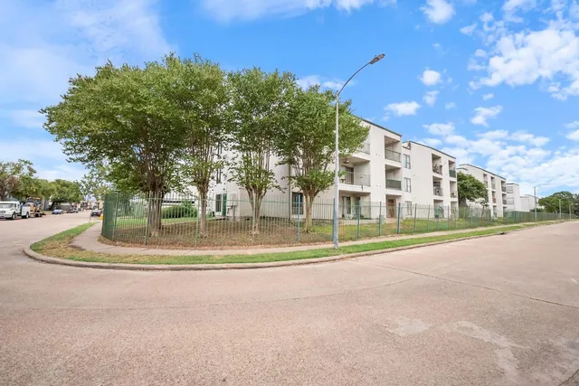 a view of building with yard