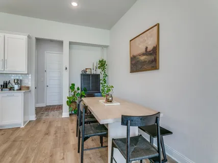 a view of a dining room with furniture