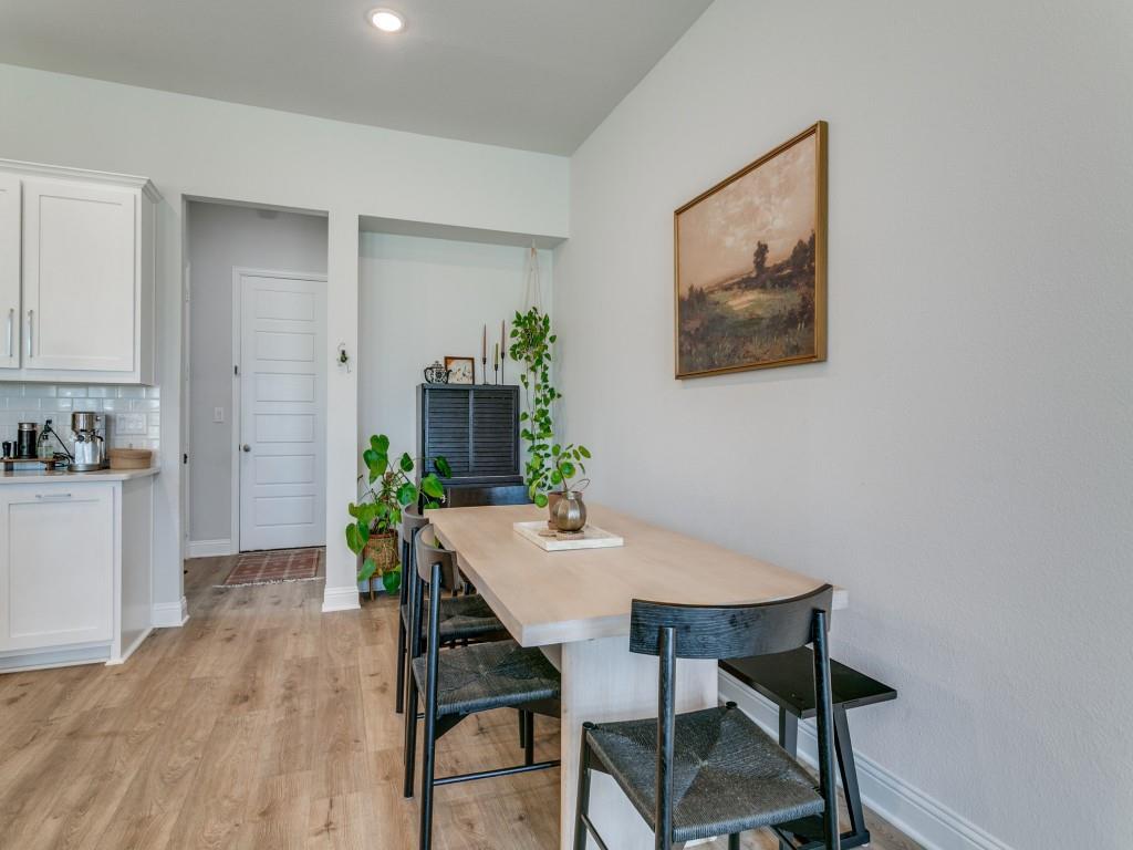 12964 Rockham Lane Dallas, TX 75234 - Photo 8 of 24 a view of a dining room with furniture