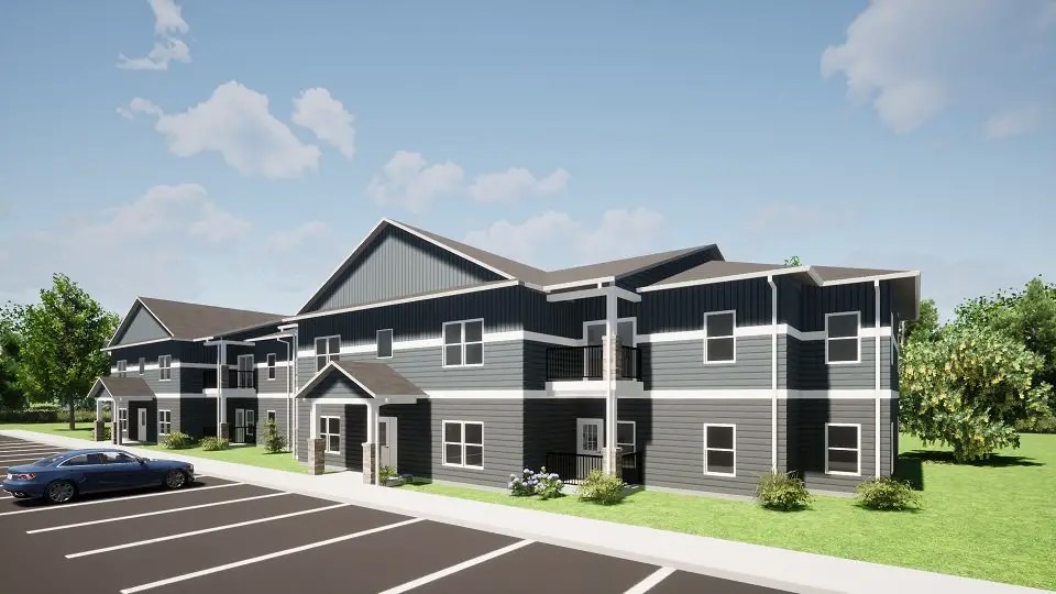 215 Northwest 11th Street Hermiston, OR 97838 - Photo 2 of 8 a view of a big house with a big yard and large trees