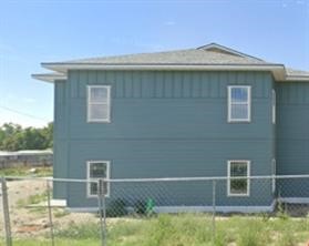 215 Northwest 11th Street Hermiston, OR 97838 - Photo 5 of 8 a front view of a house with a yard