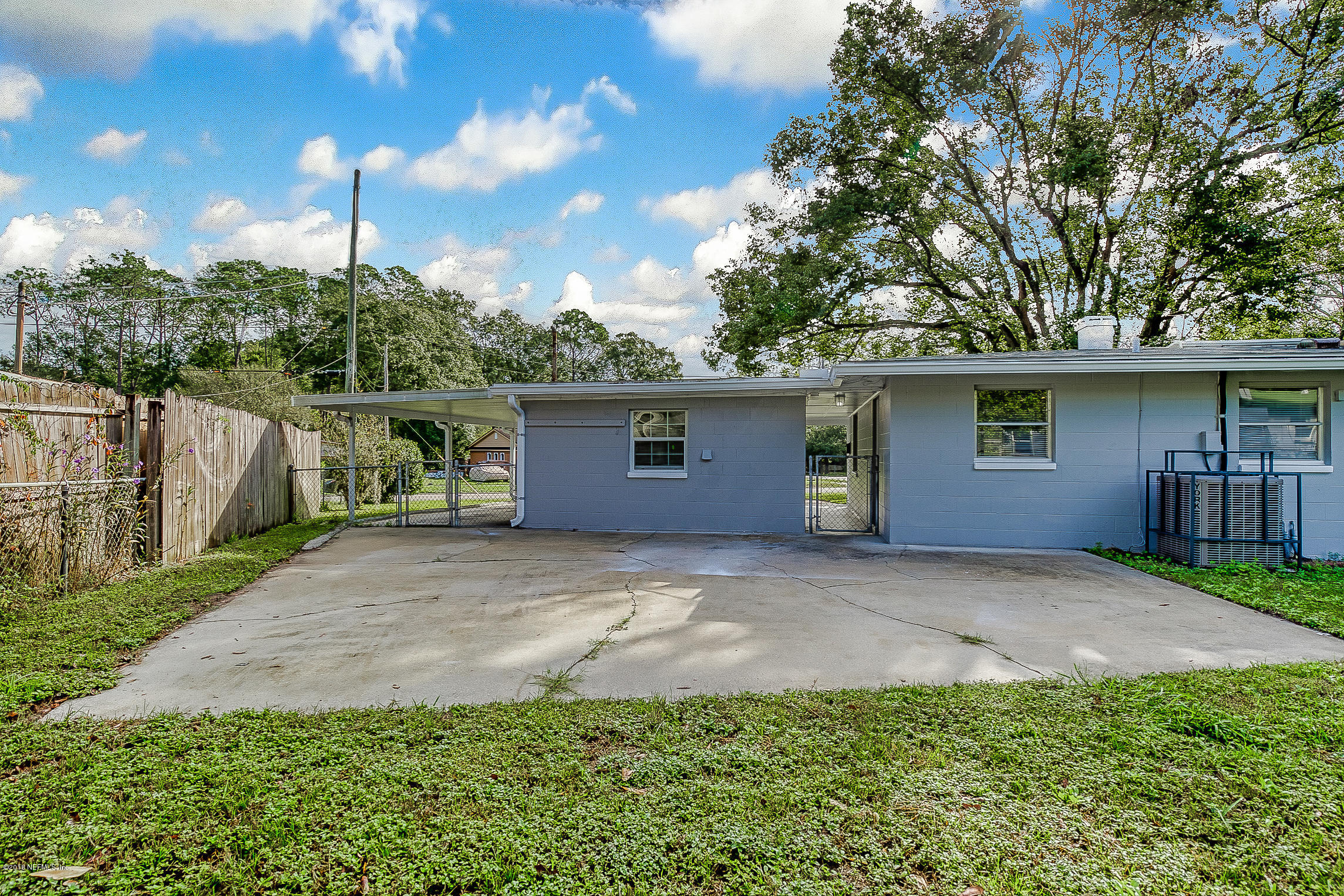 5968 Ensenada Road Jacksonville, FL 32244 - Photo 18 of 22 a view of a house with a backyard