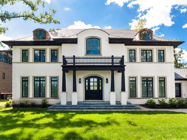 a view of a house with a swimming pool
