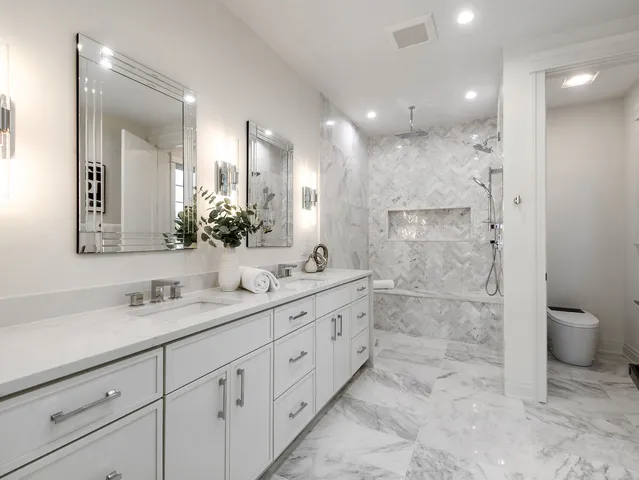 a white bath tub sitting in a bathroom