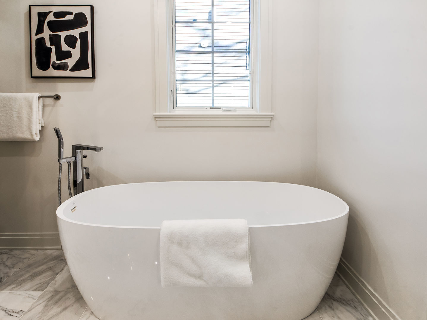 1 Morrison Road Northbrook, IL 60062 - Photo 22 of 58 a white bath tub sitting in a bathroom