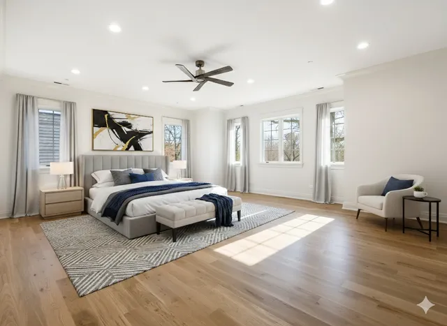 a spacious bathroom with a granite countertop sink mirror and shower