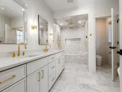 a white bath tub sitting next to a window