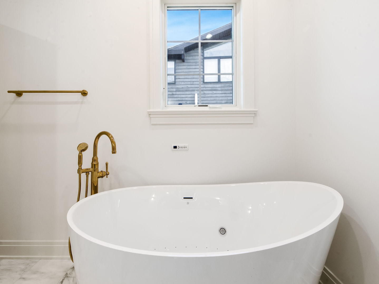 1 Morrison Road Northbrook, IL 60062 - Photo 27 of 58 a white bath tub sitting next to a window