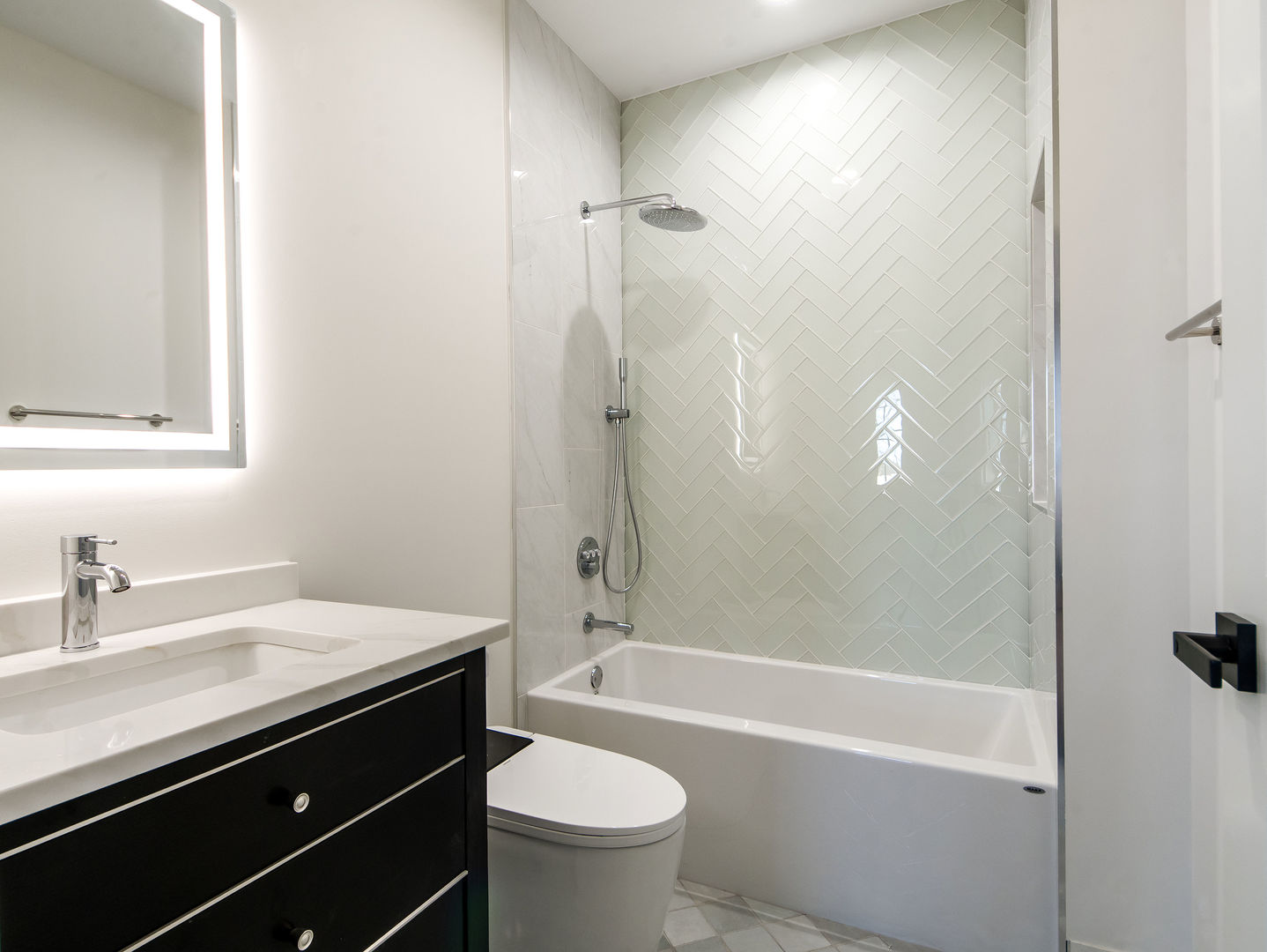 1 Morrison Road Northbrook, IL 60062 - Photo 31 of 58 a bathroom with a sink a toilet and shower