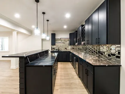 a spacious bedroom with a bed and a couch