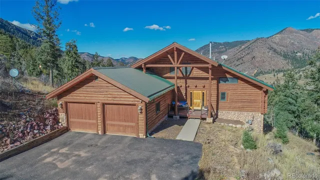 a view of a house with a tree
