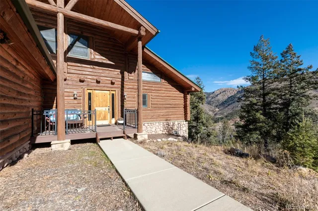 a view of a house with a street